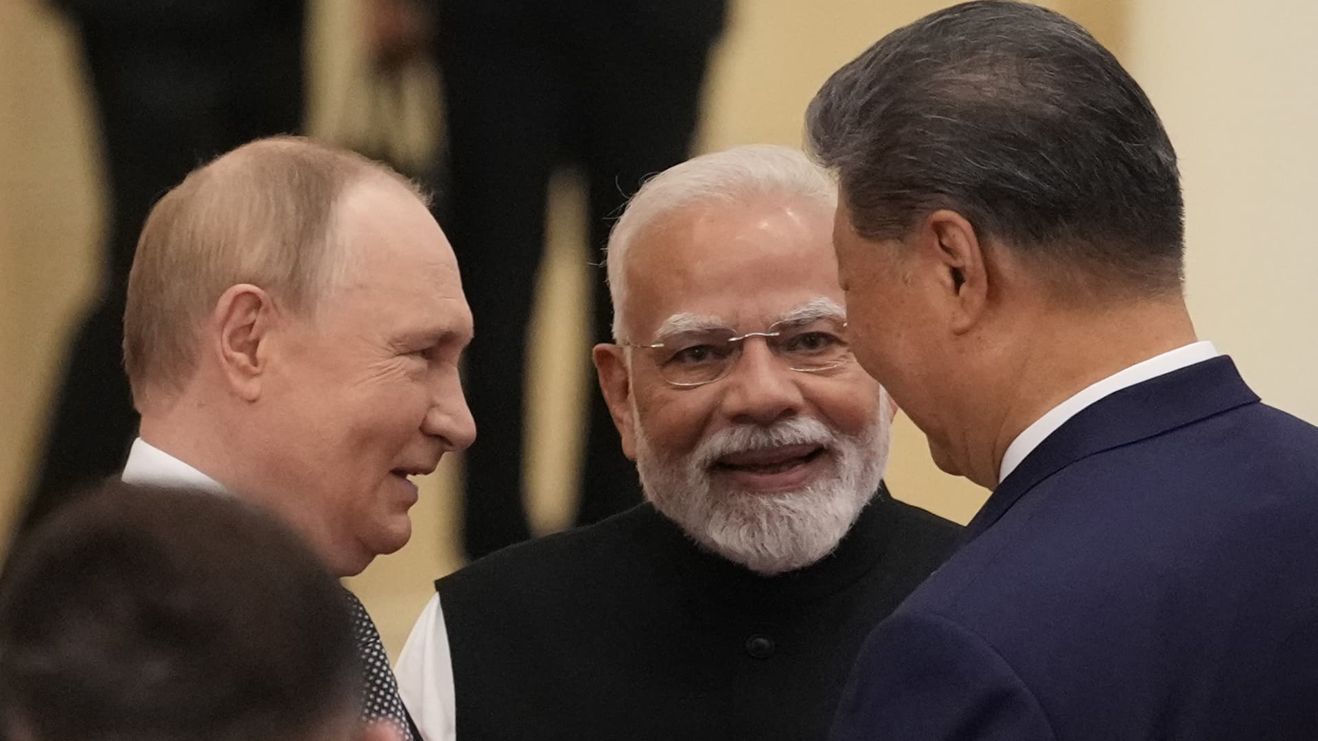 Behind the smiles with Putin, Modi and Xi at China summit